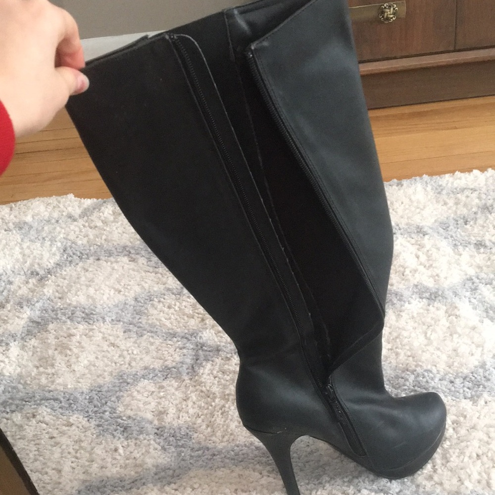 Black zip up heeled boots